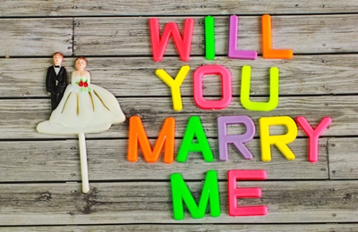 wedding bride and groom couple doll with will you marry me colorful plastic letterpress
